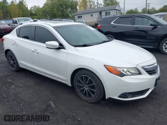 ✅ 2013 Acura ILX Premium • VIN: 19VDE1F56DE014518 • Lot: 43271521. Listed on IAAI with 98,686 mi. Free auction sales archive from the USA and detailed vehicle history report at DreamBid. Image 1.