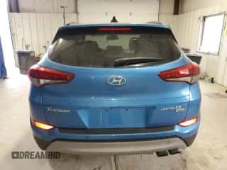 2018 Hyundai Tucson Value z VIN KM8J3CA24JU642434, wystawiony jako Copart lot #71197105 z przebiegiem 145 362 mil mil oraz Czysty tytuł • Clean title. Historia ofert i sprzedaży dostępna na DreamBid. Obrazek 6.