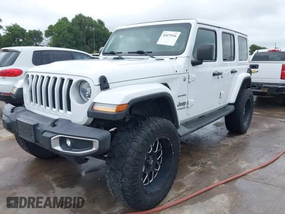 ✅ 2019 Jeep Wrangler Unlimited Sahara • VIN: 1C4HJXENXKW547676 • Lot: 42475926. Listed on IAAI with 130,952 mi. Free auction sales archive from the USA and detailed vehicle history report at DreamBid. Image 2.