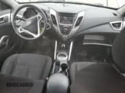 ✅ 2016 Hyundai Veloster • VIN: KMHTC6AD7GU268647 • Lot: 46264145. Wystawiony na Copart z przebiegiem 139 814 mil. Bezpłatny archiwum sprzedaży aukcyjnych z USA i szczegółowy raport historii pojazdu na DreamBid. Zdjęcie 8.