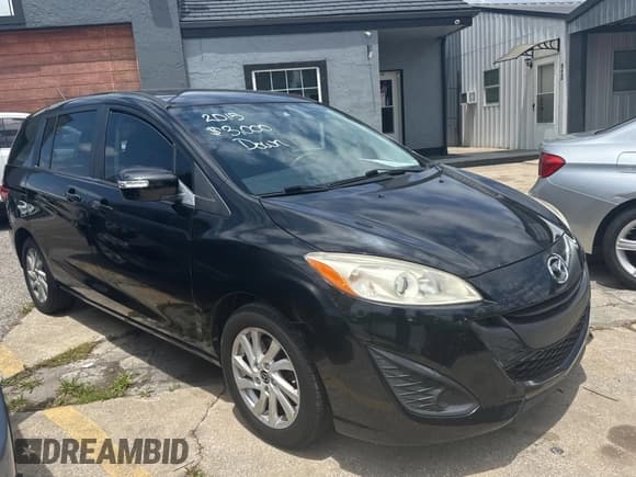 ✅ 2015 Mazda 5 Sport • VIN: JM1CW2BLXF0182880 • Лот: 59904084. Опубликован ранее на Copart с пробегом 100 383 миль. Бесплатный доступ к архиву аукционных продаж из США и подробный отчёт об истории автомобиля на DreamBid. Изображение 1.