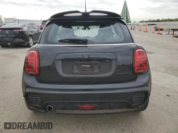 ✅ 2021 MINI Hardtop Cooper • VIN: WMWXR3C07M2N67122 • Lot: 86267695. Listed on Copart with 31,827 mi. Free auction sales archive from the USA and detailed vehicle history report at DreamBid. Image 6.