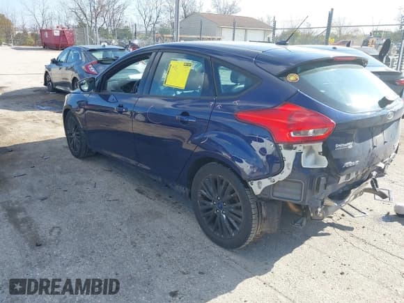 ✅ 2016 Ford Focus Titanium • VIN: 1FADP3N21GL405372 • Lot: 43574471. Listed on IAAI with 126,000 mi. Free auction sales archive from the USA and detailed vehicle history report at DreamBid. Image 3.