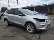 ✅ 2017 Ford Escape SE • VIN: 1FMCU9GDXHUC09809 • Lot: 82038585. Listed on Copart with 120,644 mi. Free auction sales archive from the USA and detailed vehicle history report at DreamBid. Image 4.