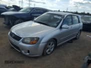 ✅ 2009 Kia Spectra Spectra5 • VIN: KNAFE241195023469 • Lot: 84055165. Listed on Copart with 142,357 mi. Free auction sales archive from the USA and detailed vehicle history report at DreamBid. Image 1.