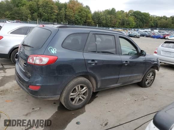 2011 Hyundai Santa Fe GLS z VIN 5XYZGDAB0BG004590, wystawiony jako Copart lot #72432574 z przebiegiem 245 132 mil mil oraz Szkoda całkowita • Salvage title. Historia ofert i sprzedaży dostępna na DreamBid. Obrazek 3.
