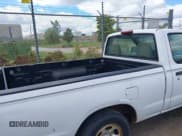 ✅ 2000 Nissan Frontier XE • VIN: 1N6DD21S1YC396142 • Lot: 43082986. Listed on IAAI with 131,181 mi. Free auction sales archive from the USA and detailed vehicle history report at DreamBid. Image 8.