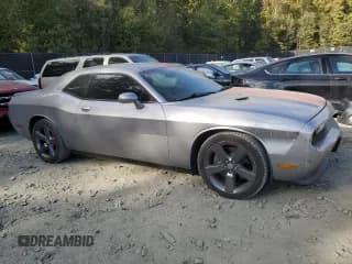 ✅ 2014 Dodge Challenger SXT • VIN: 2C3CDYAG3EH142443 • Lot: 75846514. Wystawiony na Copart z przebiegiem 94 377 mil. Bezpłatny archiwum sprzedaży aukcyjnych z USA i szczegółowy raport historii pojazdu na DreamBid. Zdjęcie 4.