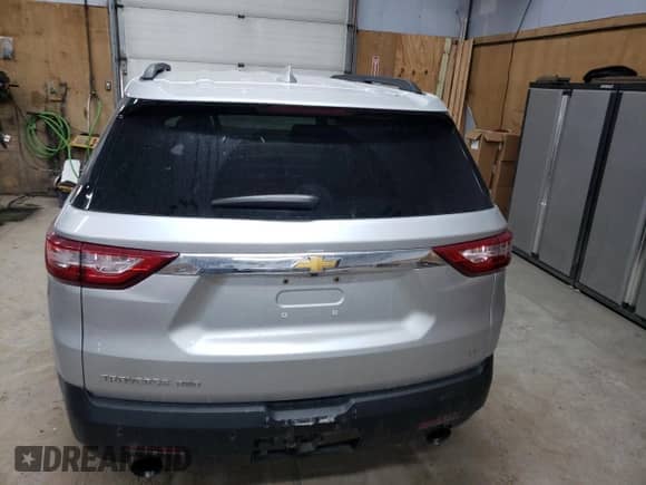 2019 Chevrolet Traverse LT z VIN 1GNEVHKW0KJ306823, wystawiony jako Copart lot #84183785 z przebiegiem 183 014 mil mil oraz Czysty tytuł • Clean title. Historia ofert i sprzedaży dostępna na DreamBid. Obrazek 6.