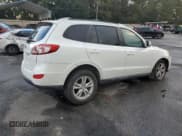 ✅ 2012 Hyundai Santa Fe SE • VIN: 5XYZH4AG2CG097607 • Lot: 79174504. Listed on Copart with 120,830 mi. Free auction sales archive from the USA and detailed vehicle history report at DreamBid. Image 3.
