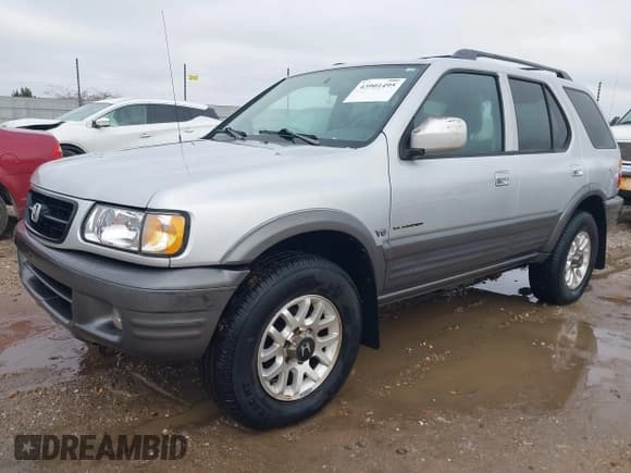 ✅ 2001 Honda Passport LX • VIN: 4S6DM58W214400568 • Lot: 43901495. Listed on IAAI with 125,005 mi. Free auction sales archive from the USA and detailed vehicle history report at DreamBid. Image 2.