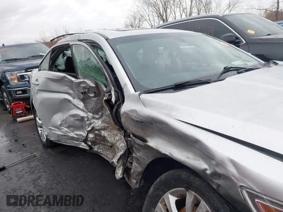 ✅ 2011 Ford Taurus SEL • VIN: 1FAHP2EWXBG115616 • Lot: 43673873. Listed on IAAI with 151,178 mi. Free auction sales archive from the USA and detailed vehicle history report at DreamBid. Image 14.