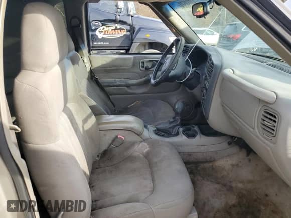 2003 Chevrolet Blazer LS с VIN 1GNCS18X03K119875, выставлен на аукционе Copart как лот 84058504 с пробегом Не указан миль и Списание • Salvage title. История ставок и продаж доступна на DreamBid. Изображение 7.