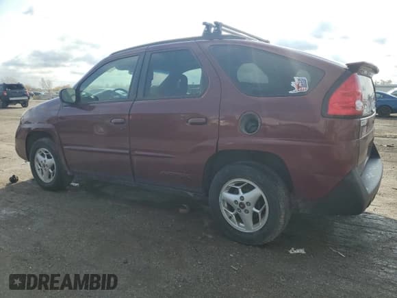 ✅ 2003 Pontiac Aztek • VIN: 3G7DA03E53S586194 • Lot: 77698474. Listed on Copart with 112,779 mi. Free auction sales archive from the USA and detailed vehicle history report at DreamBid. Image 2.