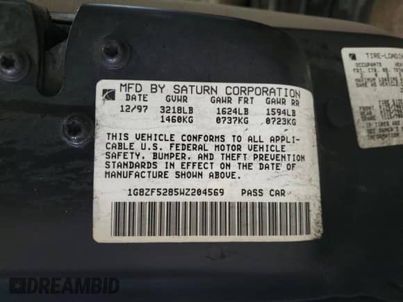 1998 Saturn SL z VIN 1G8ZF5285WZ204569, wystawiony jako Copart lot #43624765 z przebiegiem 318 544 mil mil oraz Szkoda całkowita • Salvage title. Historia ofert i sprzedaży dostępna na DreamBid. Obrazek 14.