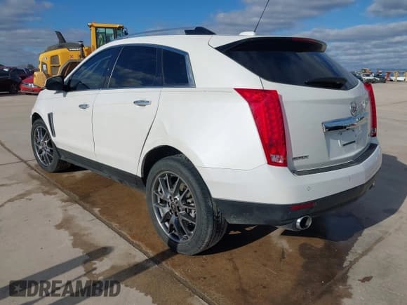 ✅ 2016 Cadillac SRX Performance Collection • VIN: 3GYFNCE39GS565215 • Lot: 41318743. Listed on IAAI with 46,063 mi. Free auction sales archive from the USA and detailed vehicle history report at DreamBid. Image 3.