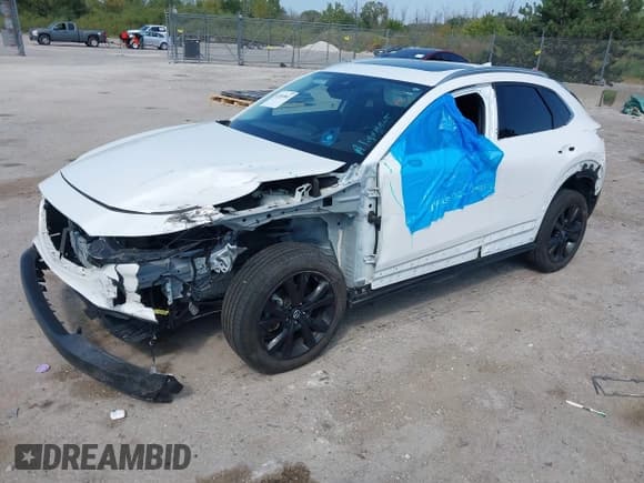 ✅ 2021 Mazda CX-30 Premium • VIN: 3MVDMBDY9MM305371 • Lot: 43203801. Listed on IAAI with 60,632 mi. Free auction sales archive from the USA and detailed vehicle history report at DreamBid. Image 2.