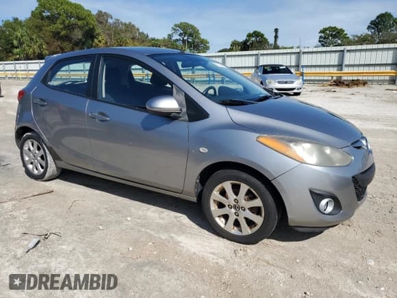 ✅ 2013 Mazda 2 Touring • VIN: JM1DE1LY7D0160988 • Лот: 77275474. Опубликован ранее на Copart с пробегом 106 080 миль. Бесплатный доступ к архиву аукционных продаж из США и подробный отчёт об истории автомобиля на DreamBid. Изображение 4.