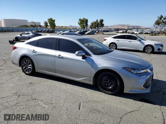 ✅ 2021 Toyota Avalon XLE • VIN: 4T1JZ1FBXMU059060 • Лот: 69061005. Опубликован ранее на Copart с пробегом 114 320 миль. Бесплатный доступ к архиву аукционных продаж из США и подробный отчёт об истории автомобиля на DreamBid. Изображение 4.