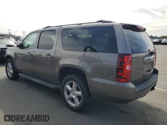 ✅ 2011 Chevrolet Suburban LS • VIN: 1GNSKHE34BR265840 • Lot: 81604565. Listed on Copart with 123,754 mi. Free auction sales archive from the USA and detailed vehicle history report at DreamBid. Image 2.