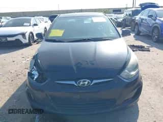2013 Hyundai Accent GS with VIN KMHCT5AE6DU084637, listed as a IAAI auction lot 43226223 with 200,530 mi miles and . Bid and sale history available at DreamBid. Image 6.