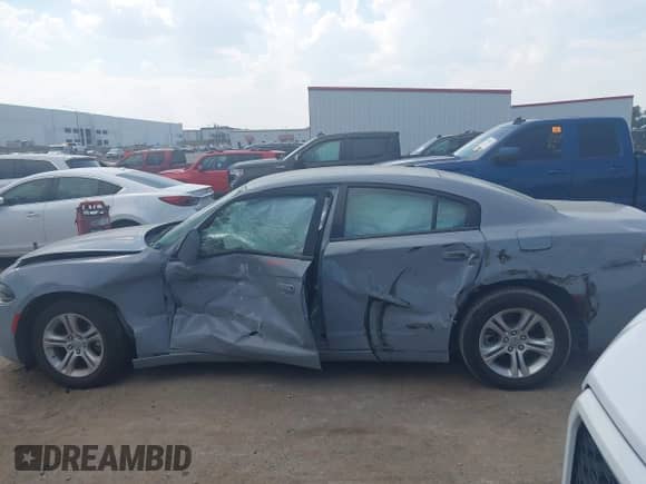 2022 Dodge Charger SXT with VIN 2C3CDXBG3NH216310, listed as a IAAI auction lot 43225885 with 81,885 mi miles and . Bid and sale history available at DreamBid. Image 14.