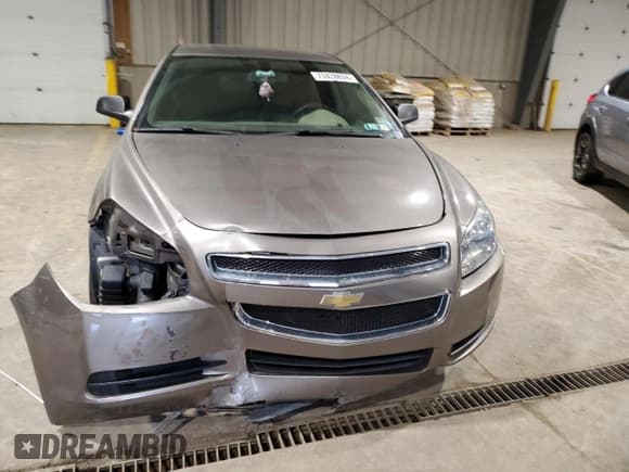 ✅ 2010 Chevrolet Malibu 1LS • VIN: 1G1ZB5EB4AF203697 • Lot: 73420834. Listed on Copart with 103,662 mi. Free auction sales archive from the USA and detailed vehicle history report at DreamBid. Image 5.