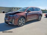 ✅ 2022 Cadillac XT6 Premium Luxury • VIN: 1GYKPCRS2NZ159559 • Lot: 86605745. Listed on Copart with 29,073 mi. Free auction sales archive from the USA and detailed vehicle history report at DreamBid. Image 1.