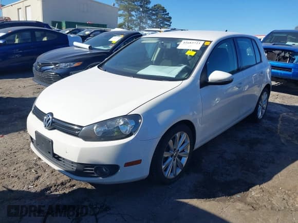 ✅ 2013 Volkswagen Golf TDI • VIN: WVWDM7AJ0DW132068 • Lot: 41683723. Listed on IAAI with 124,310 mi. Free auction sales archive from the USA and detailed vehicle history report at DreamBid. Image 2.