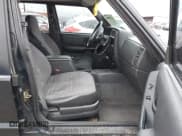 ✅ 1999 Jeep Cherokee Sport • VIN: 1J4FT68SXXL543773 • Lot: 43750806. Listed on IAAI with 248,224 mi. Free auction sales archive from the USA and detailed vehicle history report at DreamBid. Image 5.