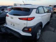 ✅ 2020 Hyundai Kona SE • VIN: KM8K1CAA9LU478571 • Лот: 81449993. Опубликован ранее на Copart с пробегом 77 431 миль. Бесплатный доступ к архиву аукционных продаж из США и подробный отчёт об истории автомобиля на DreamBid. Изображение 3.