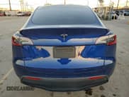 ✅ 2022 Tesla Model Y Long Range • VIN: 7SAYGDEEXNF307424 • Lot: 96515365. Listed on Copart with 52,538 mi. Free auction sales archive from the USA and detailed vehicle history report at DreamBid. Image 6.