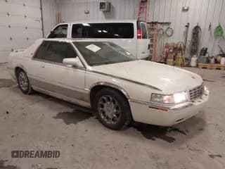 ✅ 2002 Cadillac Eldorado ESC • VIN: 1G6EL12Y82B102890 • Лот: 41511915. Опубликован ранее на IAAI с пробегом 79 116 миль. Бесплатный доступ к архиву аукционных продаж из США и подробный отчёт об истории автомобиля на DreamBid. Изображение 1.