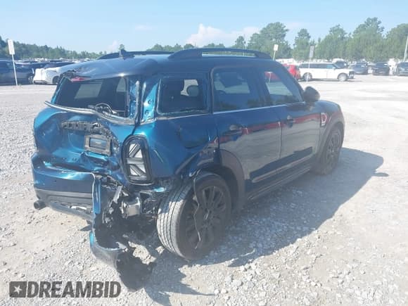✅ 2022 MINI Countryman Cooper S • VIN: WMZ53BR02N3N36112 • Lot: 42561840. Listed on IAAI with 60,479 mi. Free auction sales archive from the USA and detailed vehicle history report at DreamBid. Image 4.