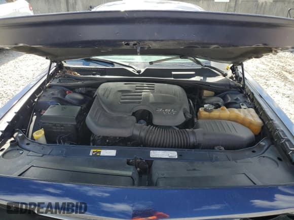 ✅ 2013 Dodge Challenger SXT • VIN: 2C3CDYAGXDH679650 • Lot: 44811435. Wystawiony na Copart z przebiegiem 125 644 mil. Bezpłatny archiwum sprzedaży aukcyjnych z USA i szczegółowy raport historii pojazdu na DreamBid. Zdjęcie 11.