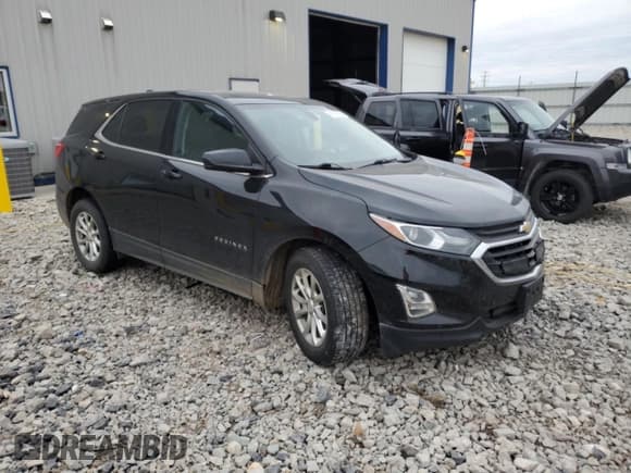 ✅ 2019 Chevrolet Equinox LT • VIN: 2GNAXUEVXK6114097 • Lot: 91019165. Listed on Copart with 105,799 mi. Free auction sales archive from the USA and detailed vehicle history report at DreamBid. Image 4.