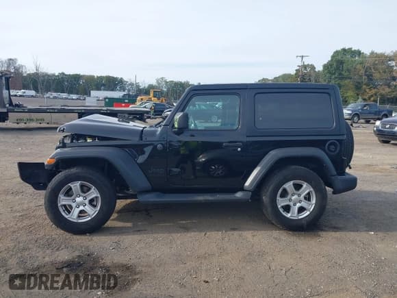 ✅ 2022 Jeep Wrangler Willys • VIN: 1C4GJXAN0NW152542 • Lot: 43302104. Listed on IAAI with 52,419 mi. Free auction sales archive from the USA and detailed vehicle history report at DreamBid. Image 15.