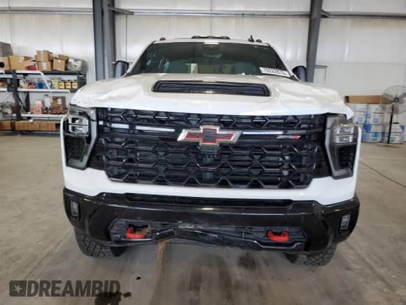 2024 Chevrolet Silverado 2500HD ZR2 с VIN 1GC4YYE73RF409778, выставлен на аукционе Copart как лот 70222875 с пробегом Не указан миль и Списание • Salvage title. История ставок и продаж доступна на DreamBid. Изображение 5.