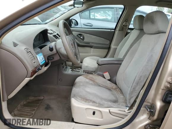 2005 Chevrolet Malibu z VIN 1G1ZS52F25F236985, wystawiony jako Copart lot #69330834 z przebiegiem Nie podano mil oraz Szkoda całkowita • Salvage title. Historia ofert i sprzedaży dostępna na DreamBid. Obrazek 7.