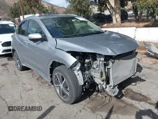 ✅ 2020 Honda HR-V Touring • VIN: 3CZRU6H9XLM729443 • Lot: 43715647. Listed on IAAI with 33,386 mi. Free auction sales archive from the USA and detailed vehicle history report at DreamBid. Image 1.