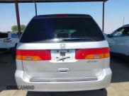 ✅ 2003 Honda Odyssey EX-L • VIN: 5FNRL18943B073157 • Lot: 43100098. Wystawiony na IAAI z przebiegiem 297 736 mil. Bezpłatny archiwum sprzedaży aukcyjnych z USA i szczegółowy raport historii pojazdu na DreamBid. Zdjęcie 16.