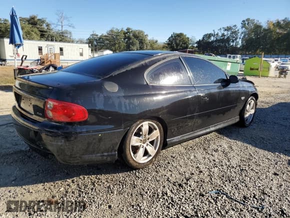 ✅ 2005 Pontiac GTO • VIN: 6G2VX12U75L408533 • Lot: 83422064. Listed on Copart with Not provided. Free auction sales archive from the USA and detailed vehicle history report at DreamBid. Image 3.