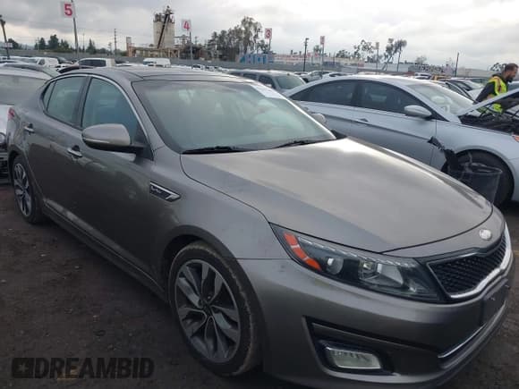 ✅ 2014 Kia Optima SX Turbo • VIN: 5XXGR4A64EG345228 • Lot: 41517684. Listed on IAAI with 145,209 mi. Free auction sales archive from the USA and detailed vehicle history report at DreamBid. Image 1.