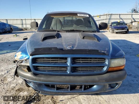 ✅ 1999 Dodge Dakota SLT • VIN: 1B7GL22X5XS321879 • Lot: 84015834. Wystawiony na Copart z przebiegiem 210 252 mil. Bezpłatny archiwum sprzedaży aukcyjnych z USA i szczegółowy raport historii pojazdu na DreamBid. Zdjęcie 5.