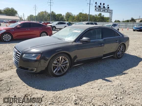 ✅ 2015 Audi A8 4.0T • VIN: WAU32AFD1FN007541 • Лот: 81677215. Опубликован ранее на Copart с пробегом 133 564 миль. Бесплатный доступ к архиву аукционных продаж из США и подробный отчёт об истории автомобиля на DreamBid. Изображение 1.