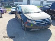 ✅ 2014 Honda Odyssey Touring • VIN: 5FNRL5H99EB051715 • Lot: 43405838. Listed on IAAI with 176,921 mi. Free auction sales archive from the USA and detailed vehicle history report at DreamBid. Image 1.