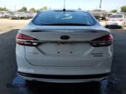 ✅ 2017 Ford Fusion Hybrid Titanium • VIN: 3FA6P0RUXHR234093 • Lot: 57997865. Wystawiony na Copart z przebiegiem 124 862 mil. Bezpłatny archiwum sprzedaży aukcyjnych z USA i szczegółowy raport historii pojazdu na DreamBid. Zdjęcie 6.