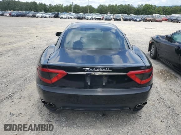 ✅ 2009 Maserati GranTurismo • VIN: ZAMGJ45A990047377 • Lot: 60991755. Listed on Copart with 95,562 mi. Free auction sales archive from the USA and detailed vehicle history report at DreamBid. Image 6.