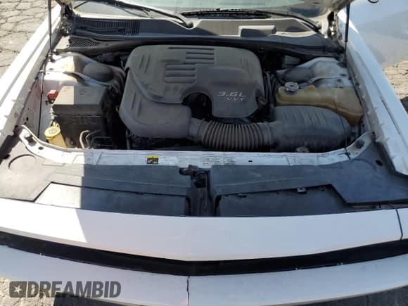 ✅ 2013 Dodge Challenger SXT • VIN: 2C3CDYAG0DH607761 • Lot: 72912064. Wystawiony na Copart z przebiegiem 194 631 mil. Bezpłatny archiwum sprzedaży aukcyjnych z USA i szczegółowy raport historii pojazdu na DreamBid. Zdjęcie 11.