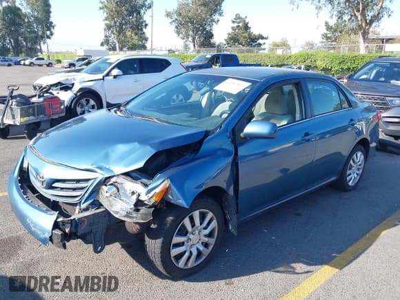 ✅ 2013 Toyota Corolla S • VIN: 5YFBU4EE4DP215370 • Lot: 43283365. Listed on IAAI with 182,843 mi. Free auction sales archive from the USA and detailed vehicle history report at DreamBid. Image 2.